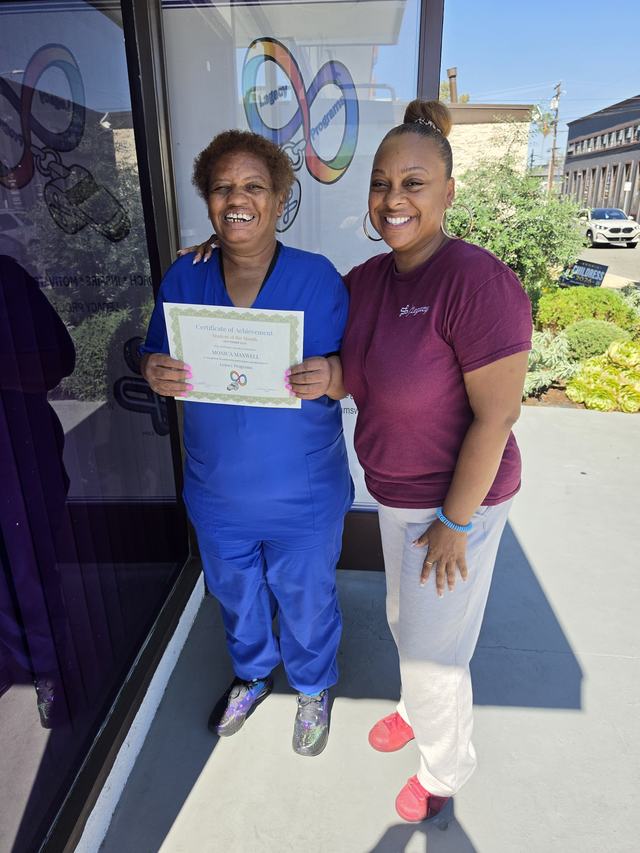 Student of the Month - Monica and her Coach DeShawn